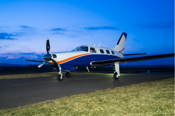 single engine plane getting ready for takeoff on runway