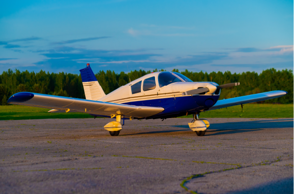 private propeller plane sitting on tarmac