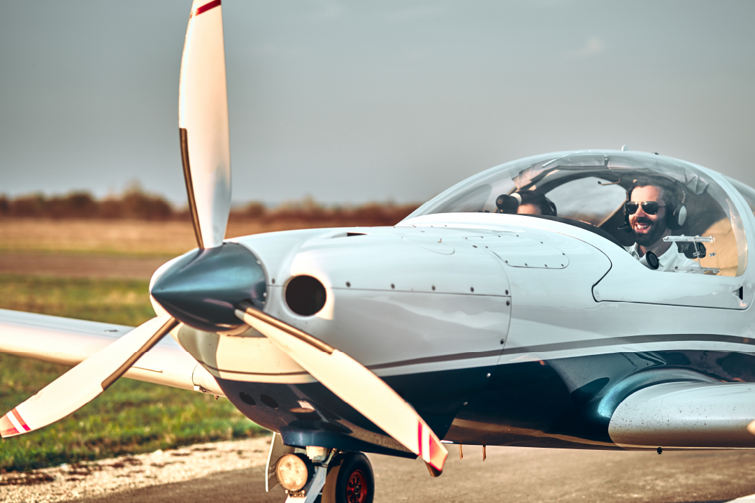 adult couple getting ready for takeoff in private single engine aircraft
