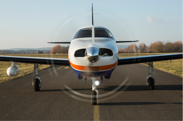 single engine private plane taking off down runway