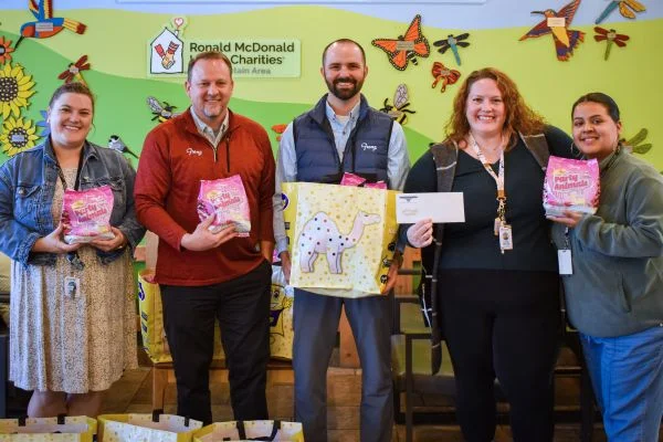 corporate partners with donations collected
